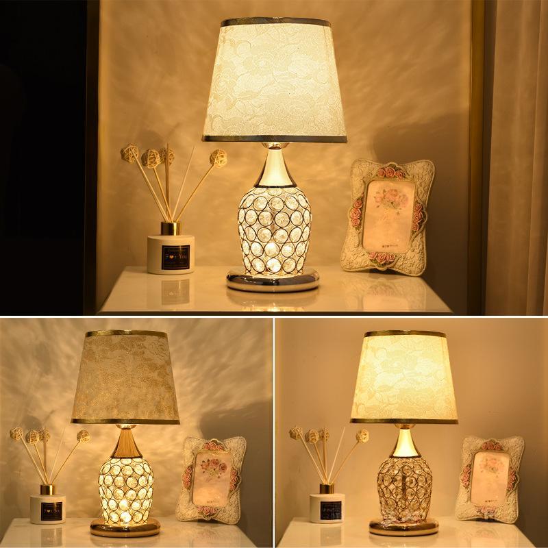 A Minimalist Modern Bedside Lamp Creates A Warm Atmosphere In The Bedroom