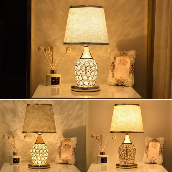 A Minimalist Modern Bedside Lamp Creates A Warm Atmosphere In The Bedroom